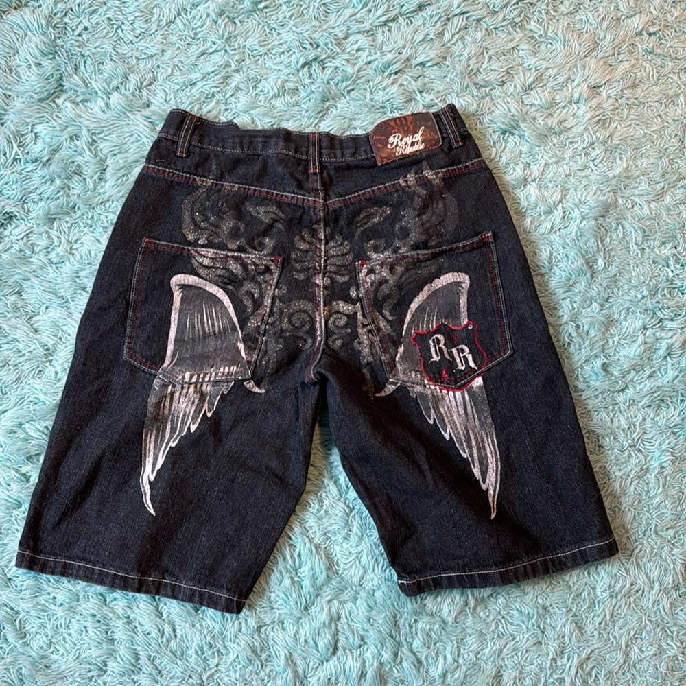 Jean shorts with sparkles and wings design on butt